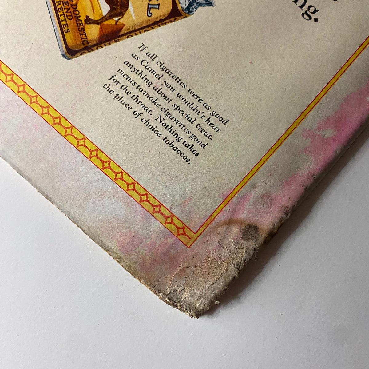 Close-up of Camel cigarette advertisement from The New Yorker Complete Magazine February 25, 1928 showing wear around the edges.
