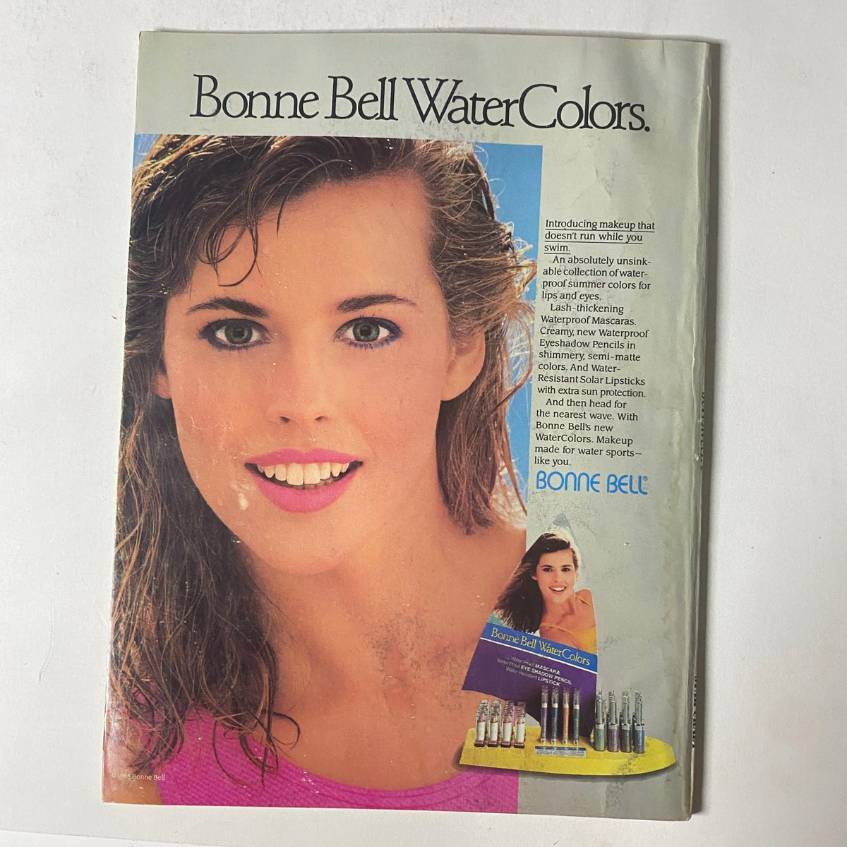 Seventeen Magazine July 1988 The Chynna Syndrome Feature displaying a Bonne Bell Water Colors advertisement with a model promoting vibrant makeup options.