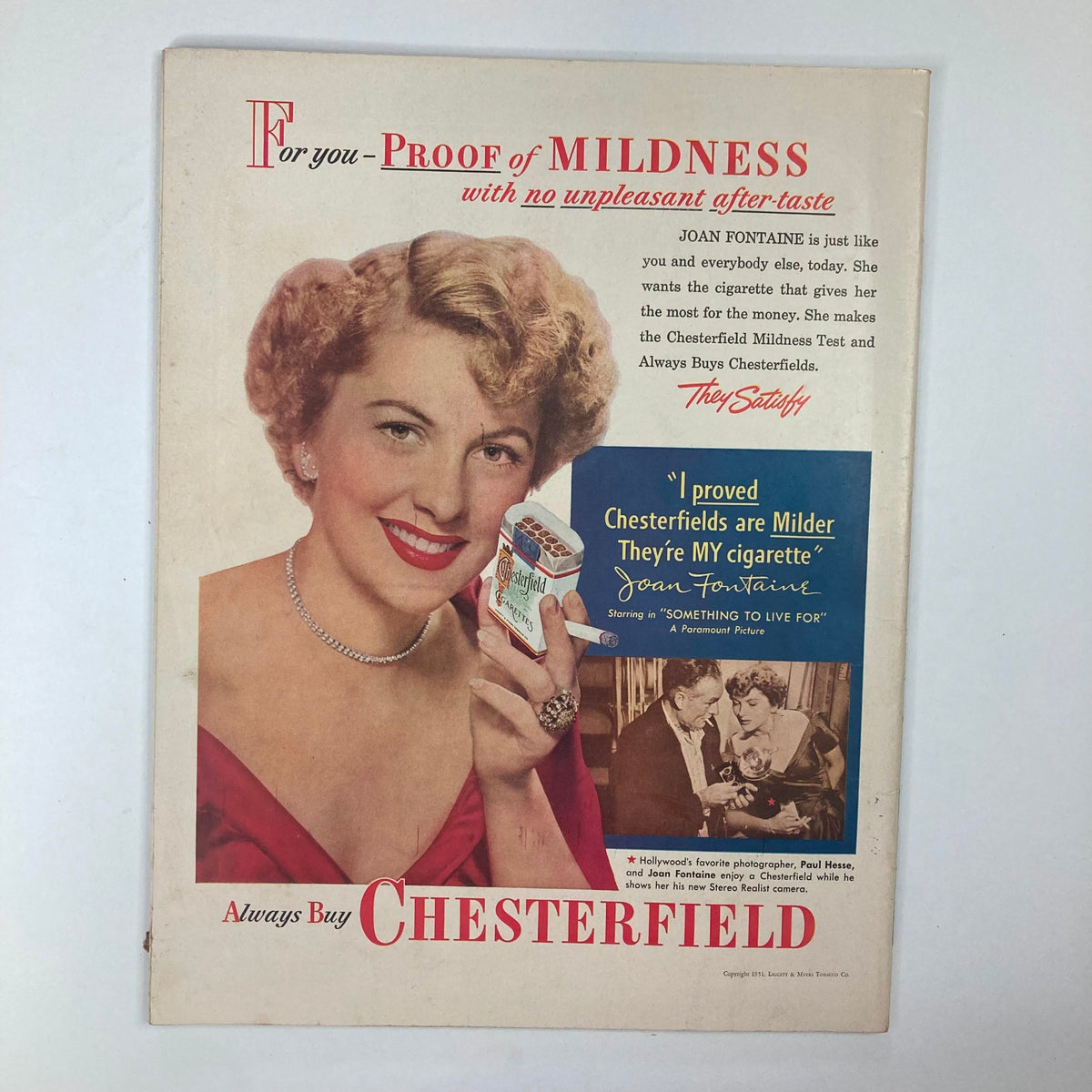 Vintage advertisement from Collier's Magazine April 28, 1951 featuring actress Joan Fontaine promoting Chesterfield cigarettes, showcasing her smiling face and elegant attire.