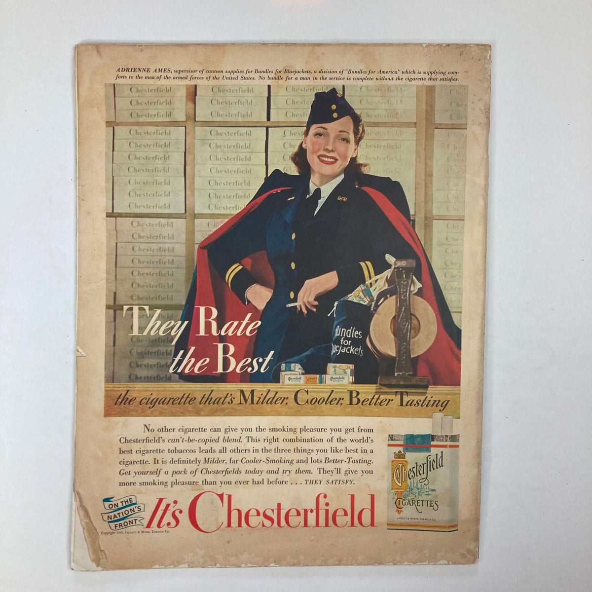 Vintage advertisement featuring a woman in military attire promoting Chesterfield cigarettes, from the VTG Collier's Magazine May 9 1942, Volume 100, No. 19, titled 'We Shall Win or We Shall Die'.