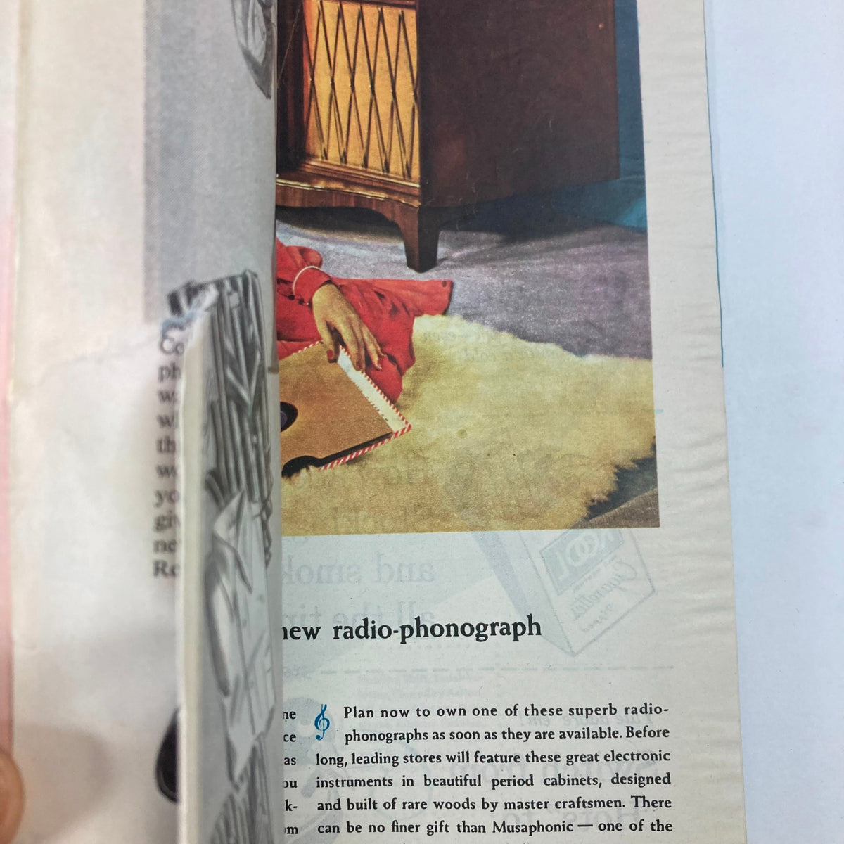 Interior page from VTG Collier's Magazine December 1 1945 featuring a vintage advertisement for a radio-phono system with an engaging scene of a woman relaxing.