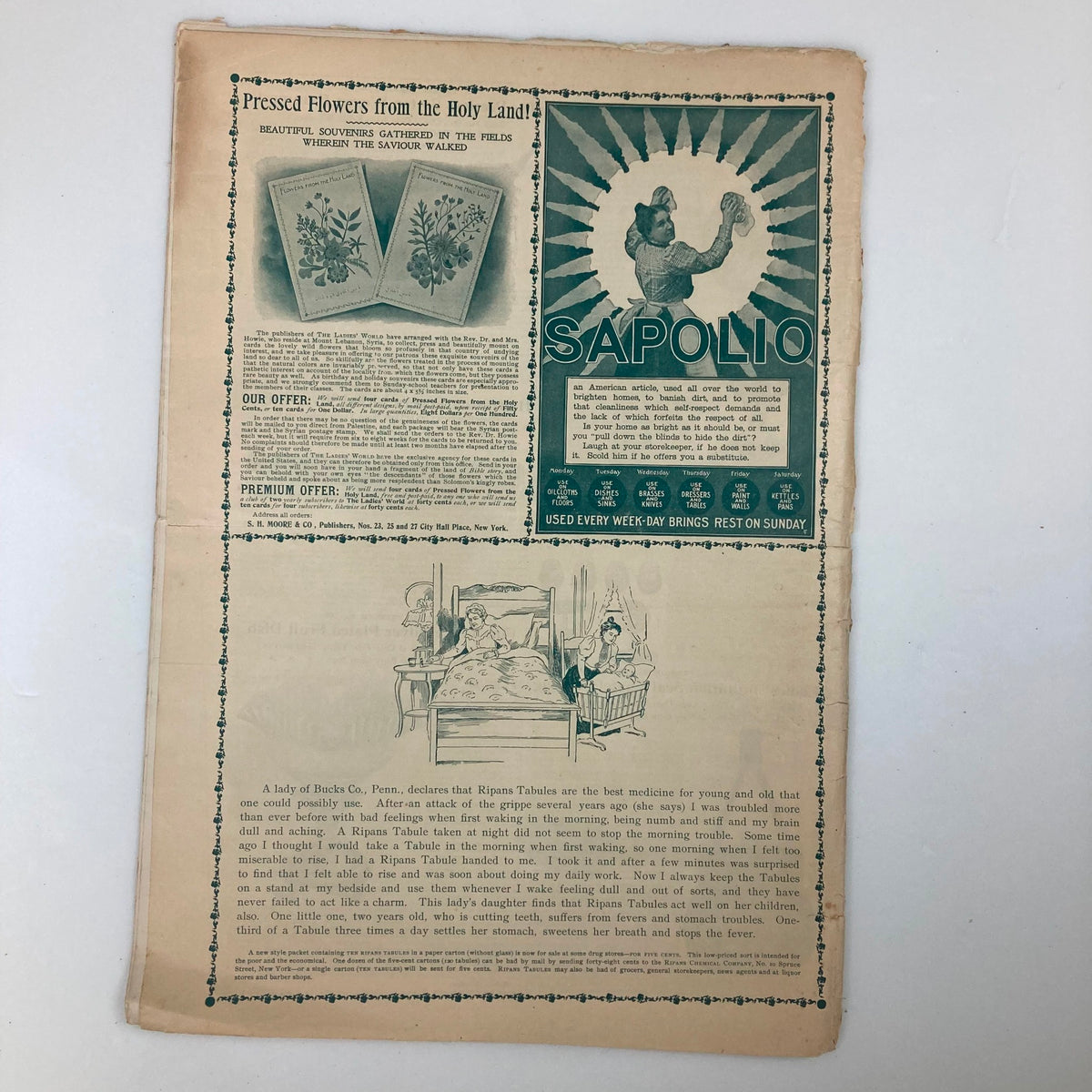 Vintage magazine page from The Ladies World, August 1898, featuring advertisements and illustrations, showcasing historical elements and design of the late 19th century.