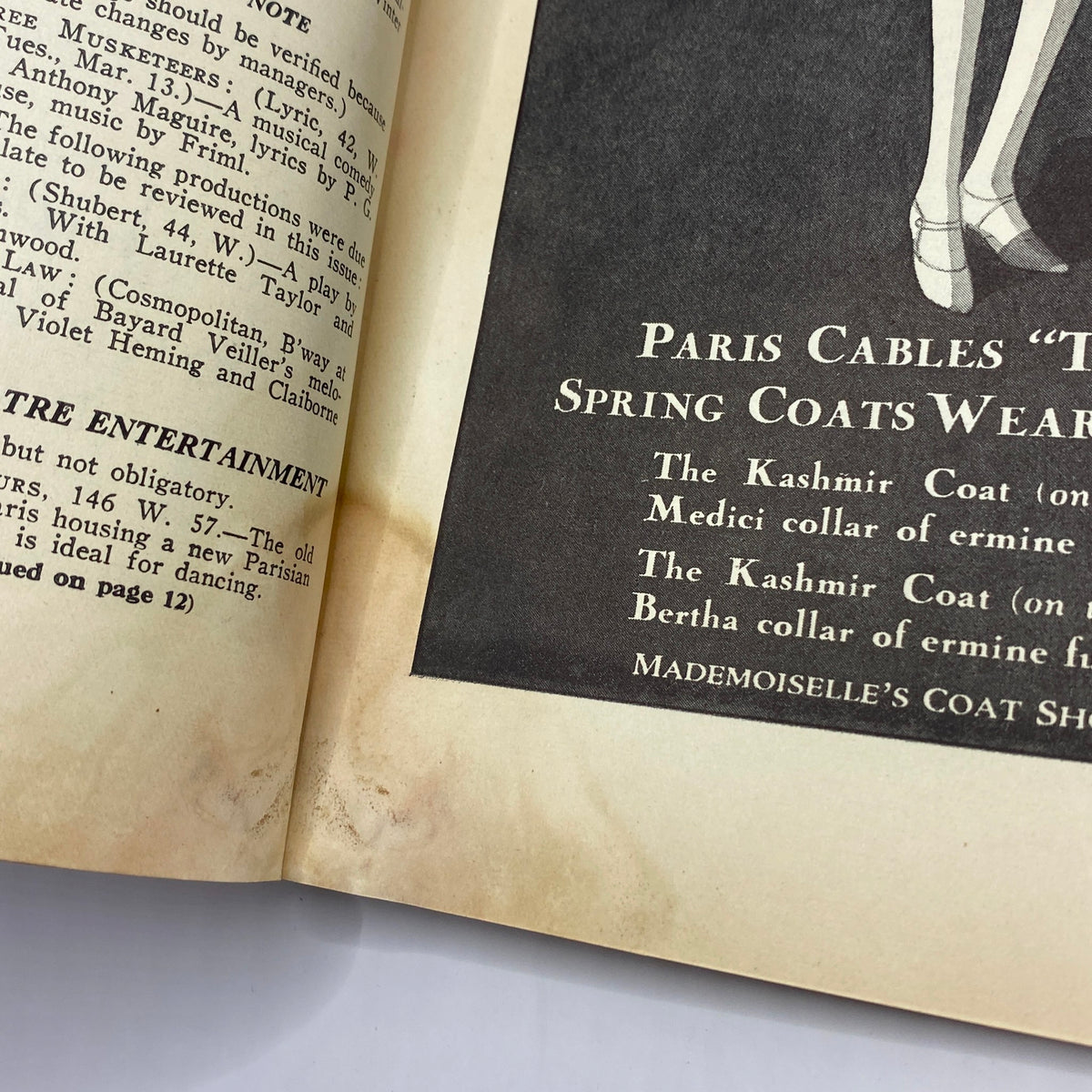 Interior page of The New Yorker magazine from March 10, 1928, highlighting an advertisement for Paris Cables Spring Coats with an elegant illustration and promotional details.
