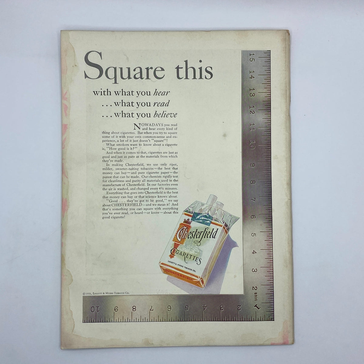 Inside page advertisement from The New Yorker Complete Magazine November 14, 1931 featuring Chesterfield Cigarettes with a display of cigarette packaging and a ruler for size reference.