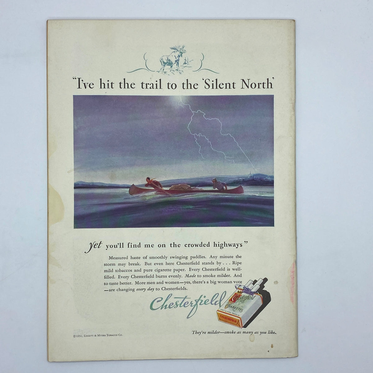 Back cover of The New Yorker Complete Magazine August 8, 1931, featuring an advertisement for Chesterfield cigarettes with an artistic depiction of a stormy landscape and canoeists.