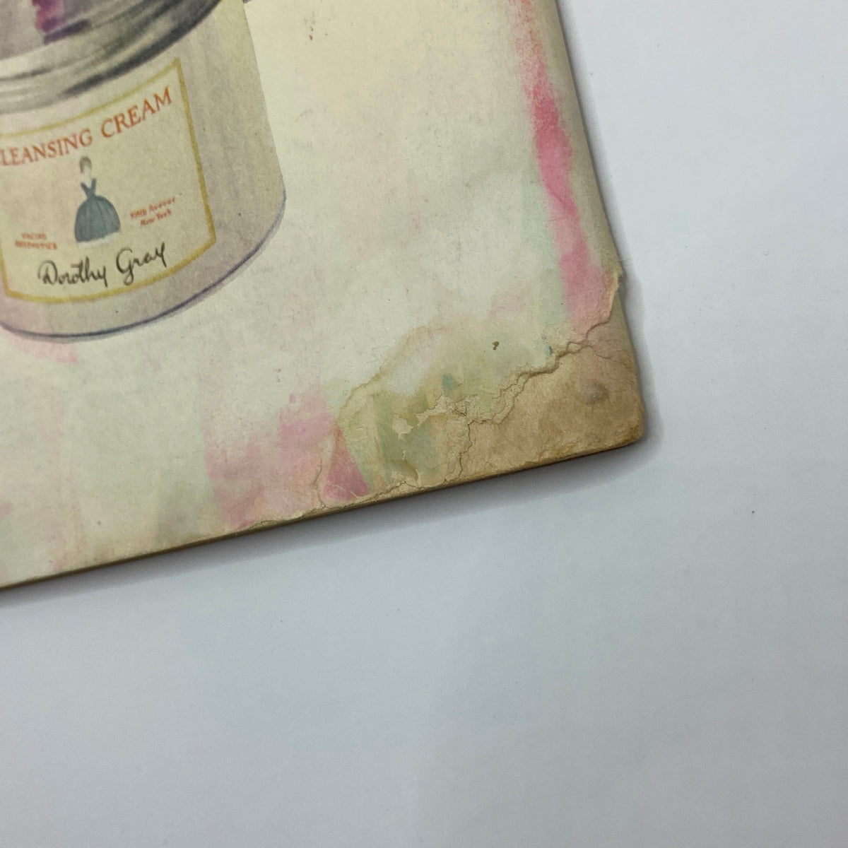 Close-up of the back cover of The New Yorker Complete Magazine May 12, 1928 displaying a corner detail of Dorothy Gray's beauty product advertisement, showing age-related wear.