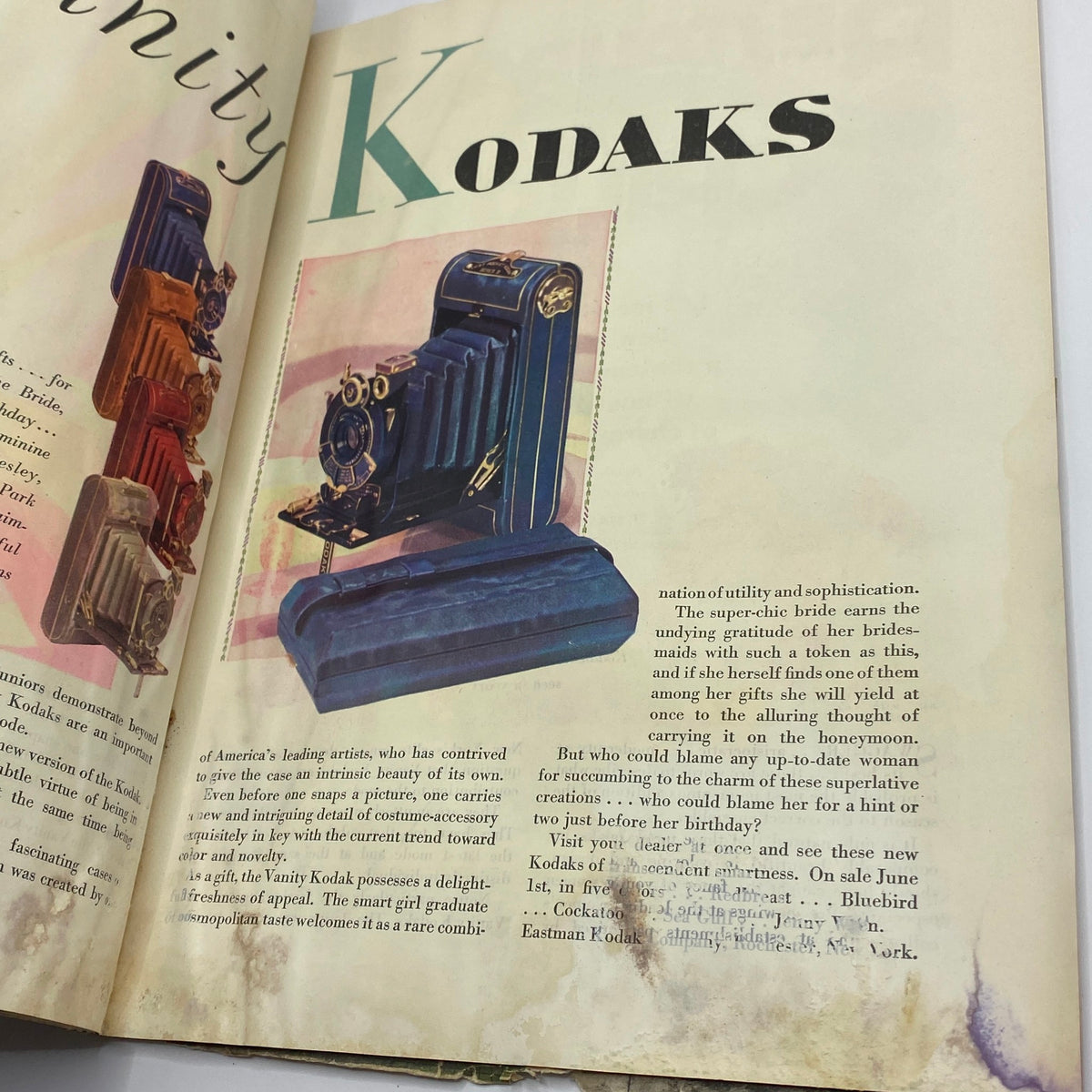 Interior page of The New Yorker Complete Magazine June 2, 1928 showcasing colorful Kodak camera advertisements, reflecting early 20th century artistry.