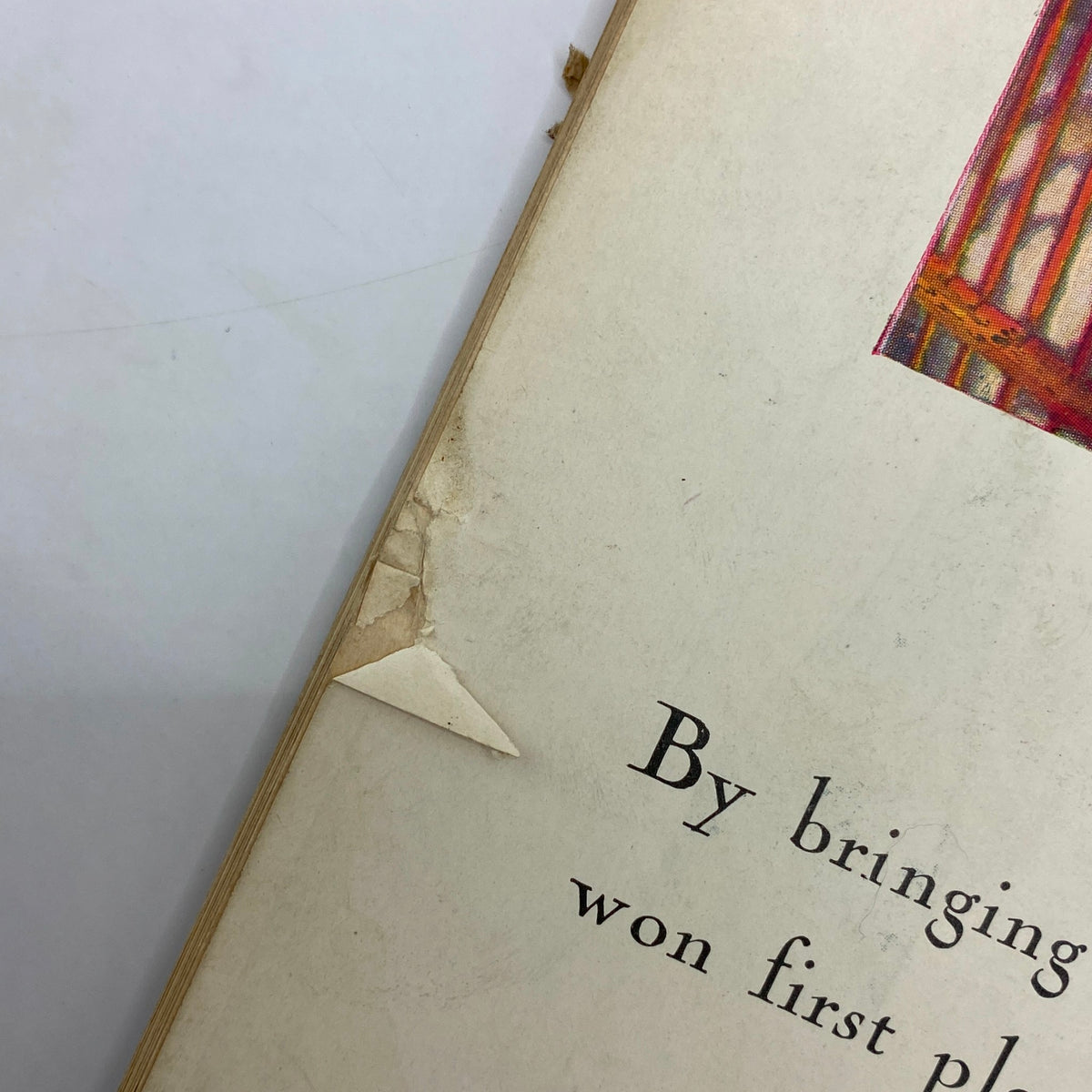 Close-up detail of The New Yorker Complete Magazine September 8, 1928 showing a tear in the corner, highlighting the magazine's vintage condition.