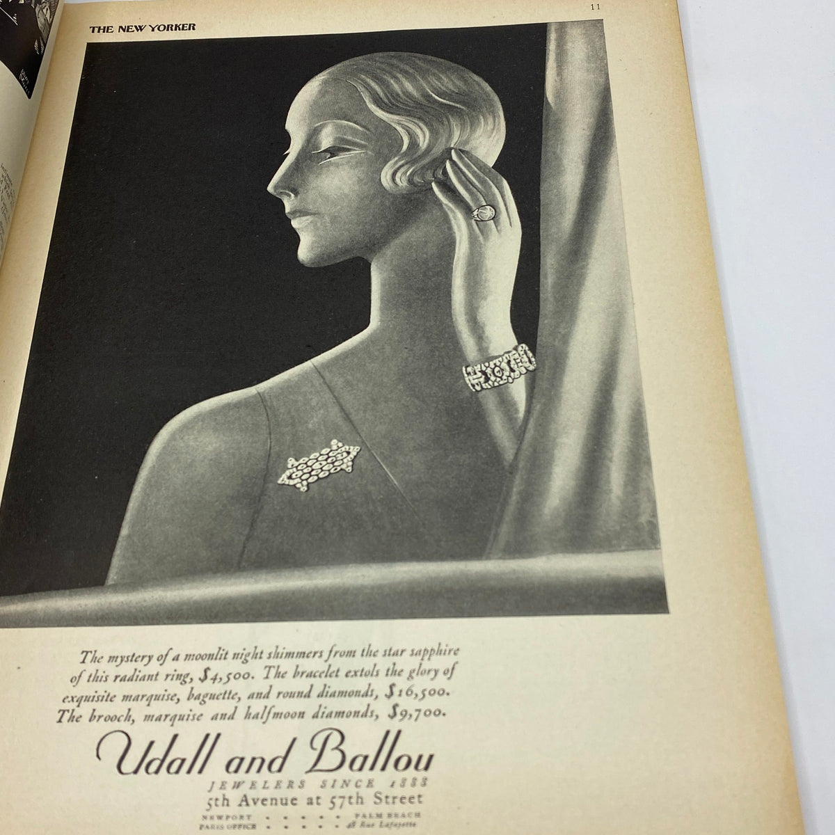 An interior illustration from The New Yorker Complete Magazine – October 12, 1929, highlighting an elegant advertisement for Udall and Ballou, featuring glamorous jewelry and a stylish female figure.