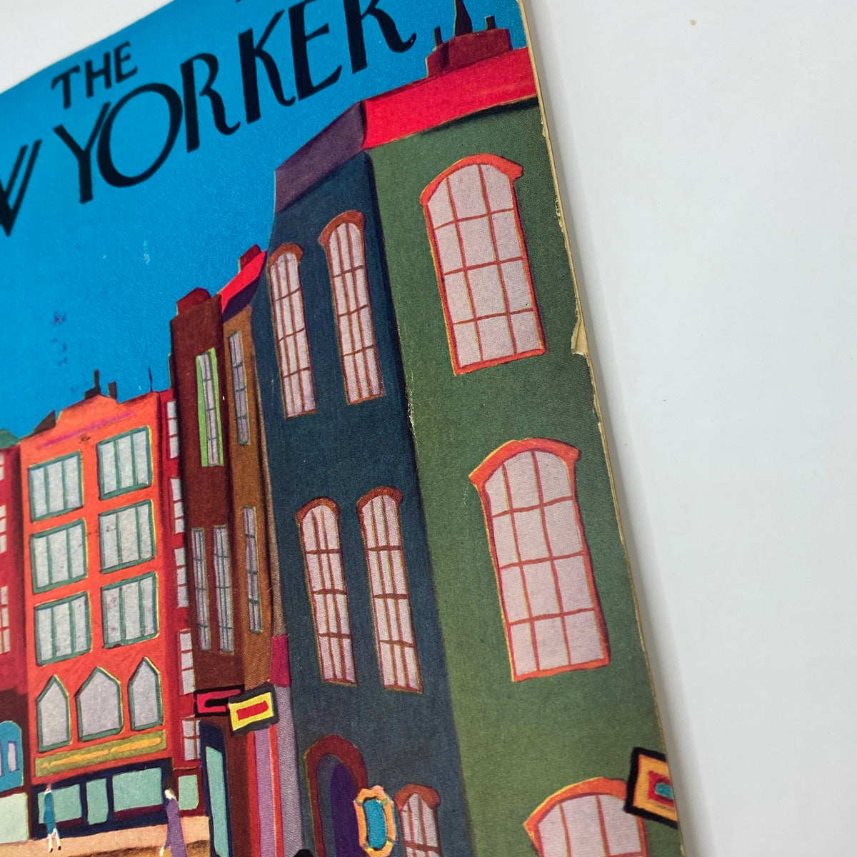 The New Yorker Complete Magazine April 20, 1929 cover featuring a colorful urban illustration by Adolph Kronengold, showcasing early 20th-century architecture.