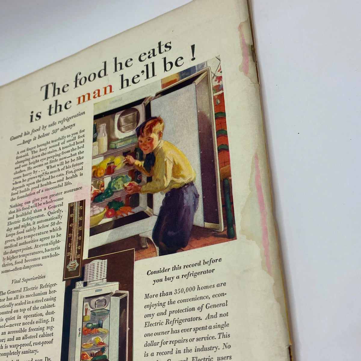 Page from The New Yorker Complete Magazine September 21, 1929 featuring a vintage advertisement for General Electric Refrigerators, illustrating a boy interacting with a refrigerator.