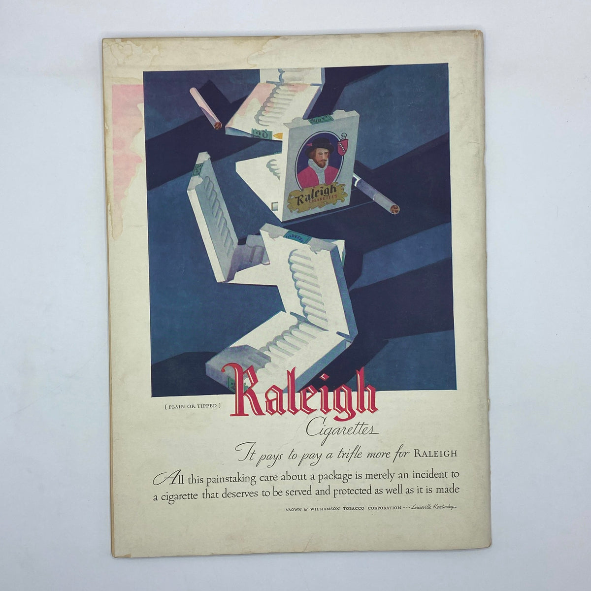 Advertisement for Raleigh Cigarettes featured in The New Yorker magazine, February 15, 1930, showcasing a creative design with illustrations of cigarette boxes.