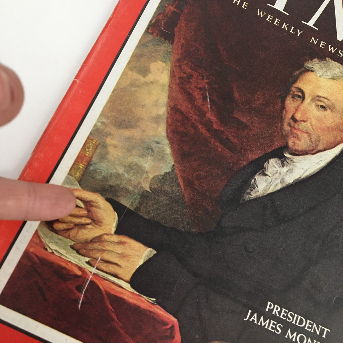 Close-up of Time Magazine September 21 1962 Vol. 80 No. 12 cover showing President James Monroe with an emphasis on his hands and the magazine's detailing.