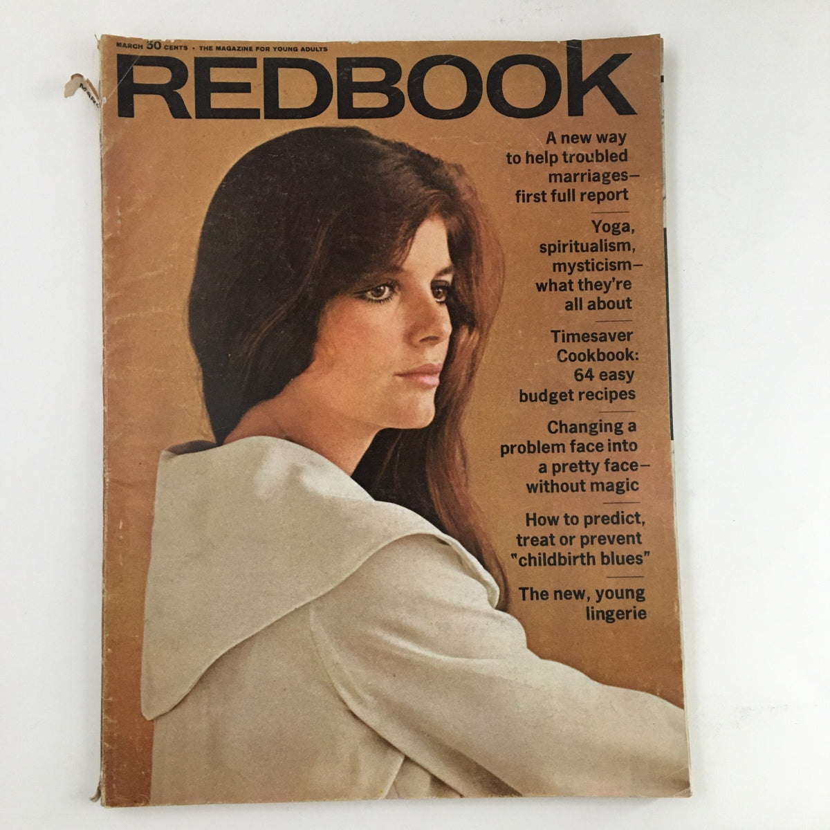 Cover of Redbook Magazine from March 1968 featuring a young woman in a white hoodie, showcasing articles on marriage, yoga, and women's issues.