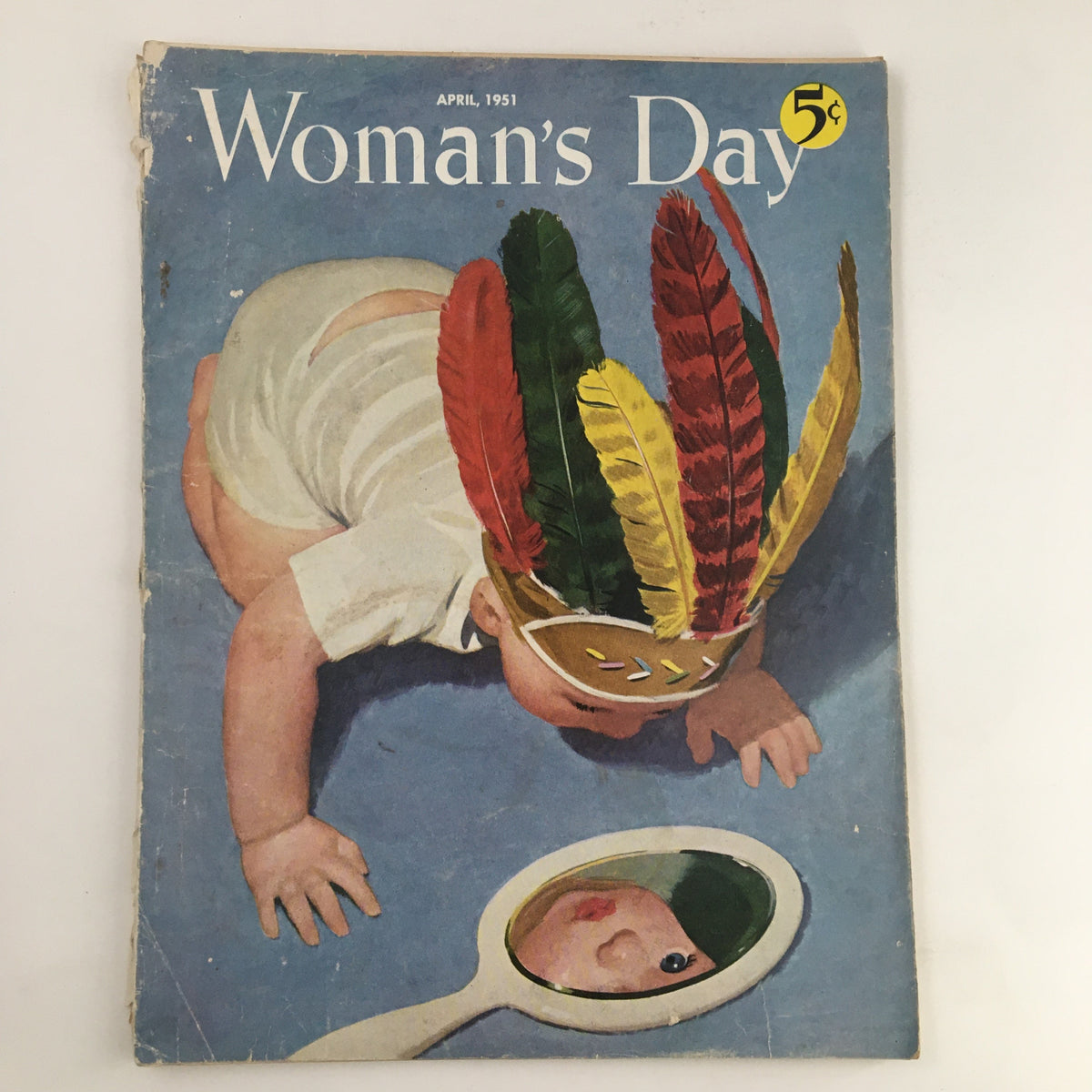 Cover of Woman's Day Magazine April 1951 featuring a colorful illustration of a baby with feathers and a mirror, representing vintage magazine aesthetics.