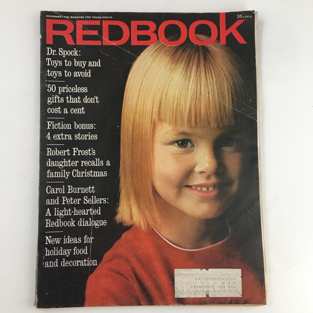 Cover of Redbook Magazine December 1963 featuring the title prominently. The magazine highlights an article by Robert Frost's daughter recalling family Christmas. A young girl with blonde hair is featured on the cover.