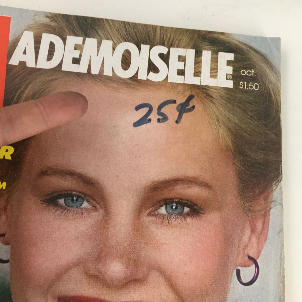 Close-up of the cover of Mademoiselle Magazine, October 1979, titled 'The Pleasures & Perils of Being Single Today'. Highlights the smiling woman's face and magazine title with a handwritten price.