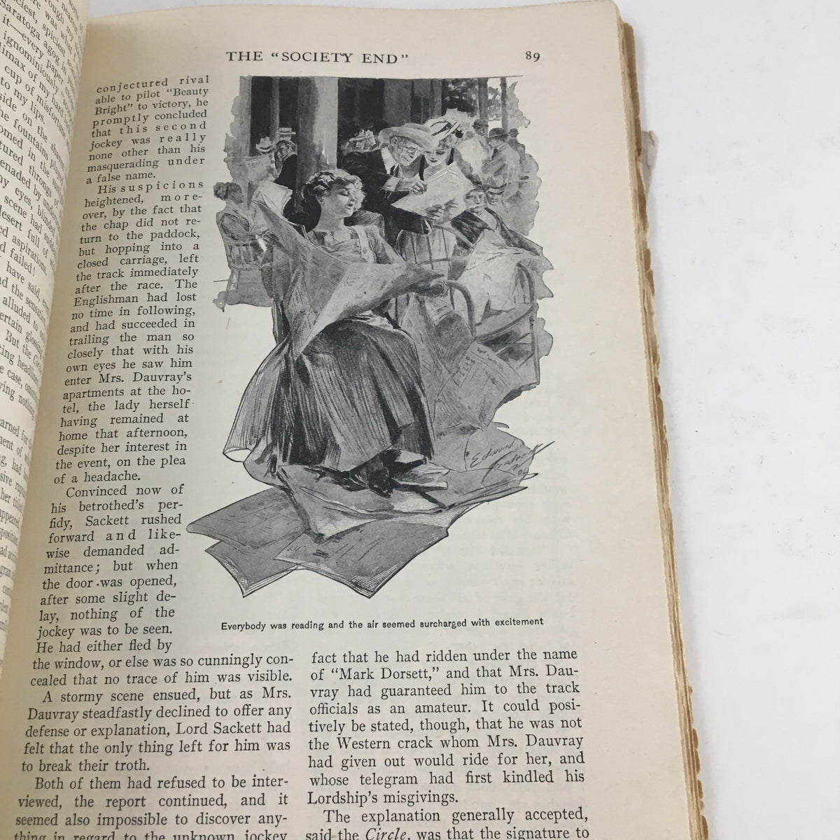 Interior page from The Redbook Magazine May 1910 featuring a black and white illustration with readers engaged in excitement.