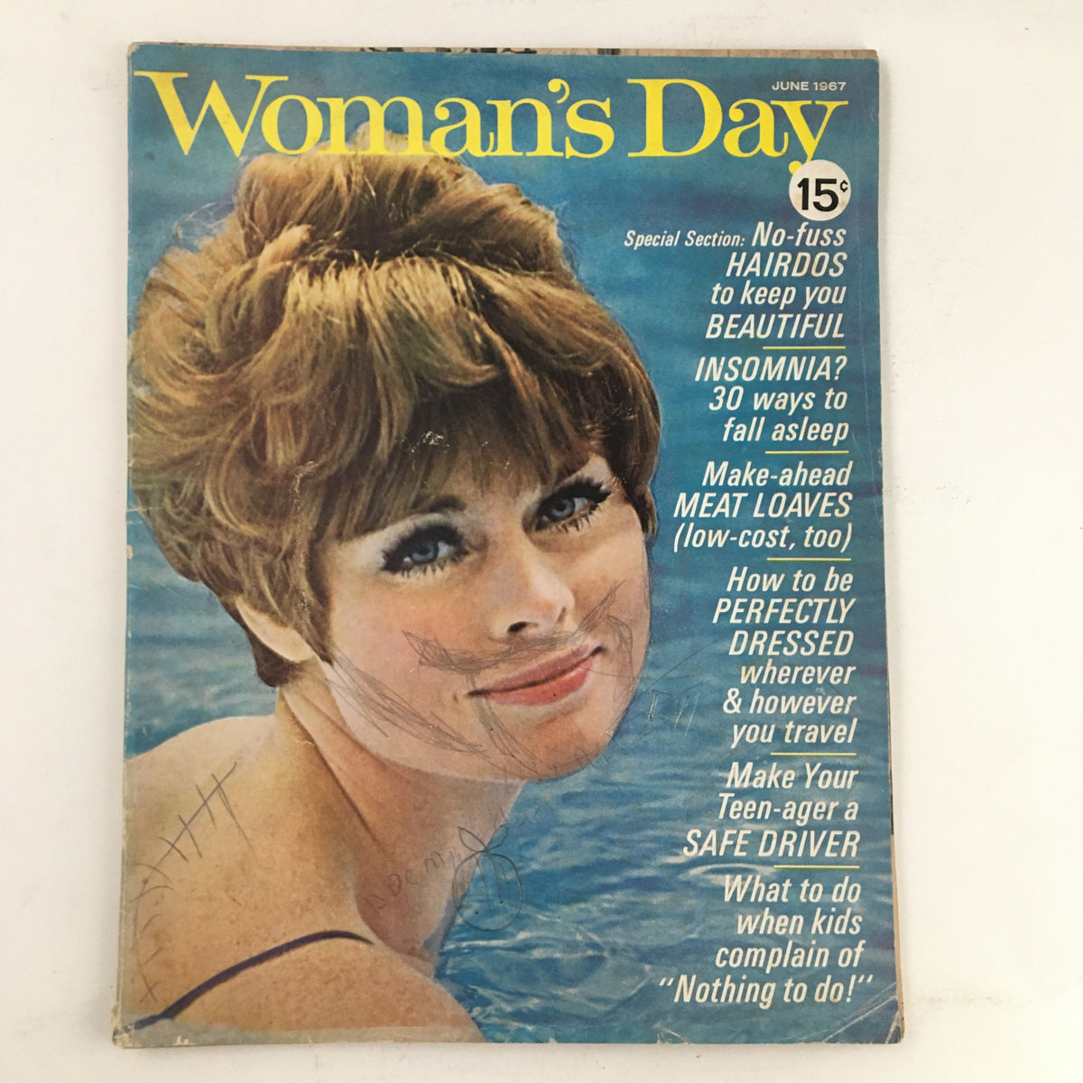 Woman's Day Magazine June 1967 cover featuring a woman with stylish hair, showcasing articles about summer vacations and beauty tips.