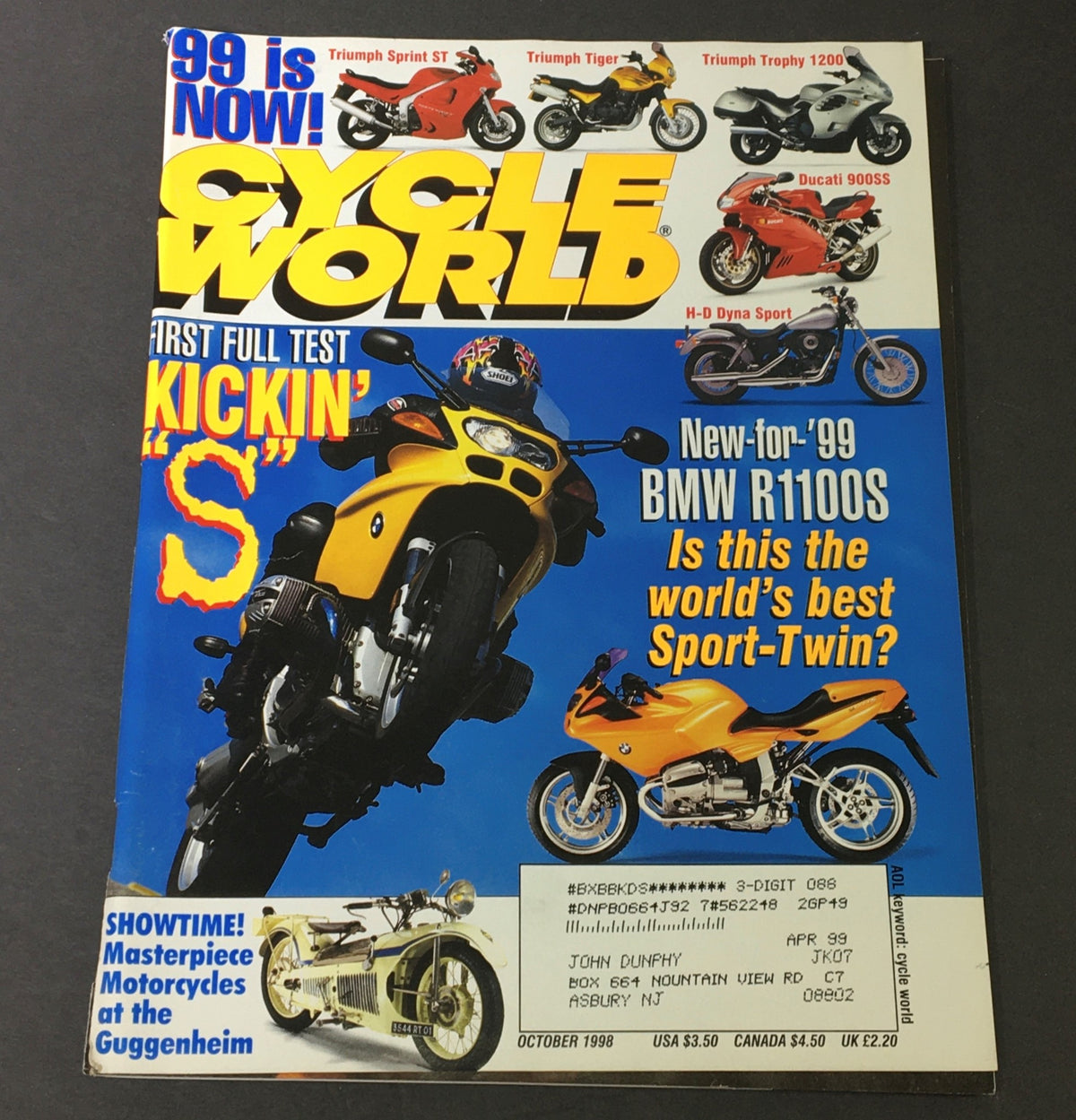 Cycle World Magazine October 1998 featuring the Triumph Sprint ST, Tiger, and Trophy 1200 on the cover, showcasing various motorcycles including BMW R1100S and Ducati 900SS, highlighting significant motorcycle models from the late '90s.