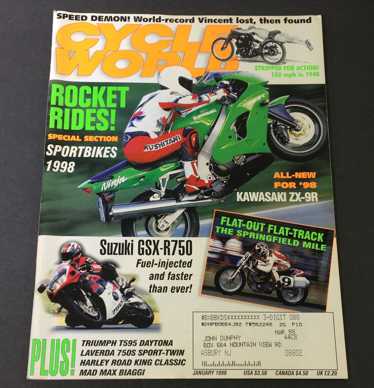 Cycle World Magazine January 1998 featuring the Kawasaki ZX-XR and Suzuki GSX-R750 on the cover, showcasing sportbikes with vibrant graphics and detailed motorcycle visuals.
