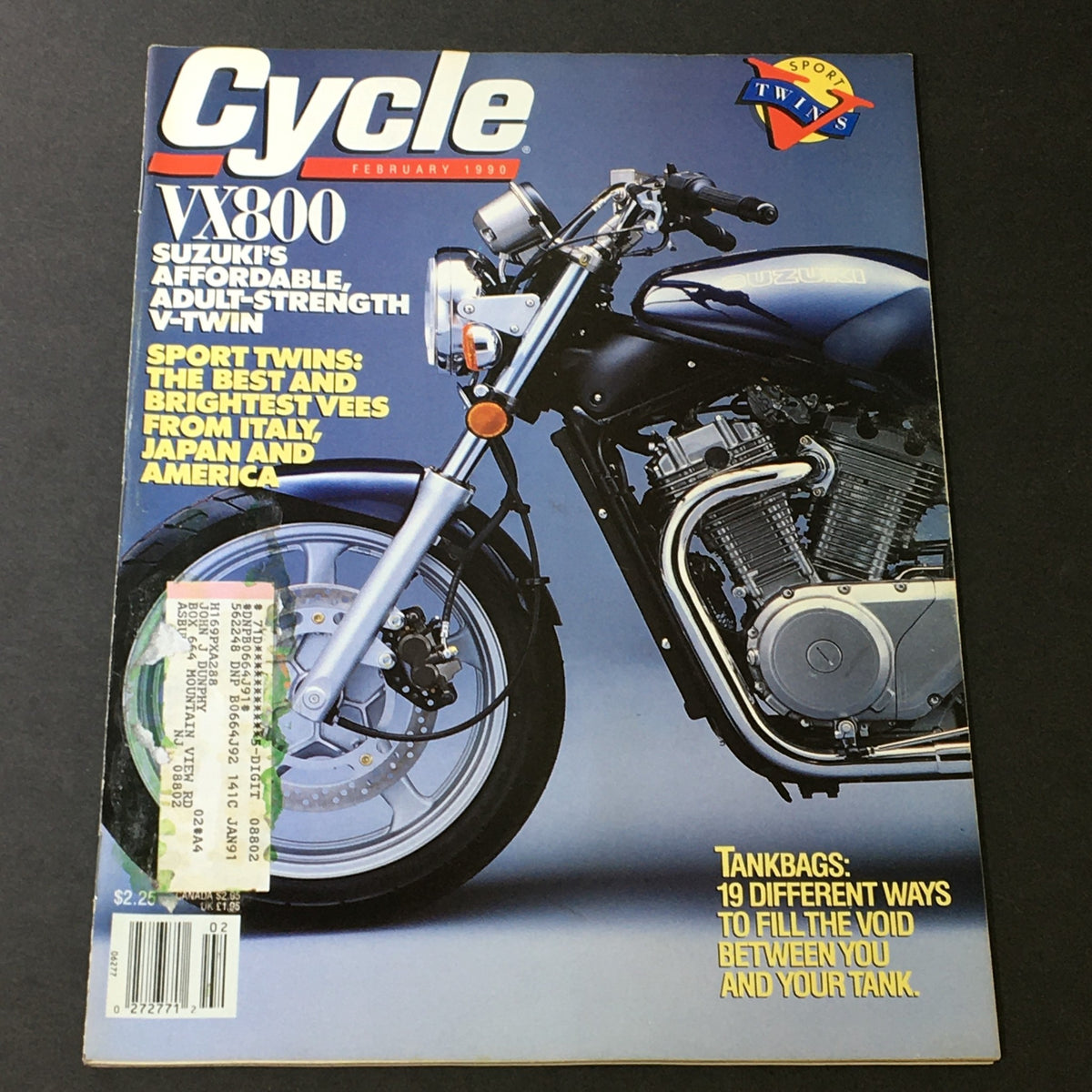 Cycle Magazine February 1990 featuring the Suzuki VX800 V-Twin, showcasing a motorcycle on the cover with vibrant graphics and details on sport twins from Japan and America.
