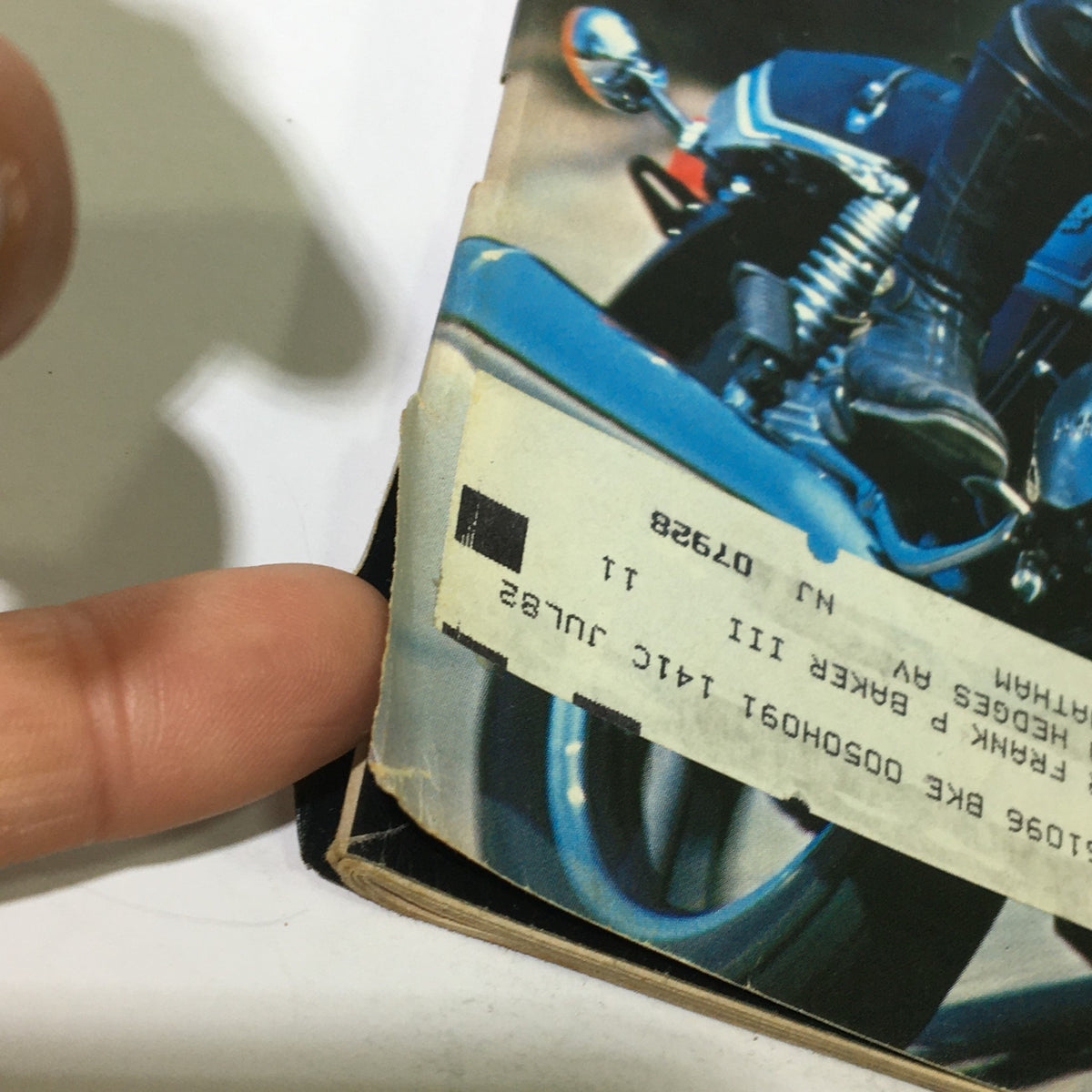 Close-up of the edge of the Vintage Cycle Magazine - November 1981, showing the wear and address label, reflecting its historical significance and collectible status for motorcycle enthusiasts.