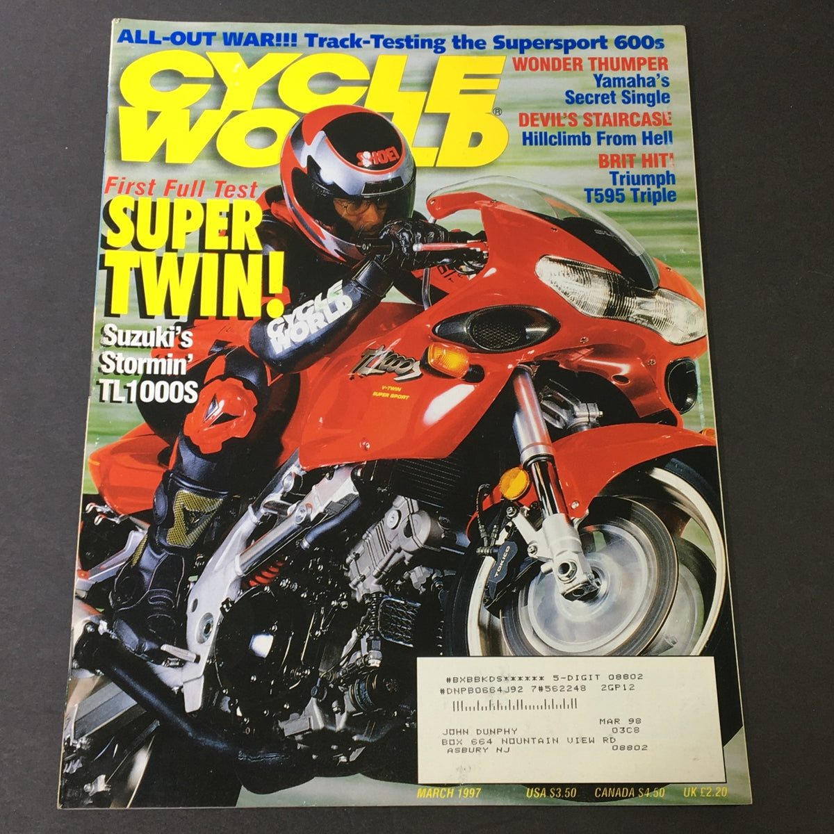 Cycle World Magazine March 1997 featuring Supersport 600s and Triumph T595 Triple on the cover with an illustration of a motorcycle and rider.
