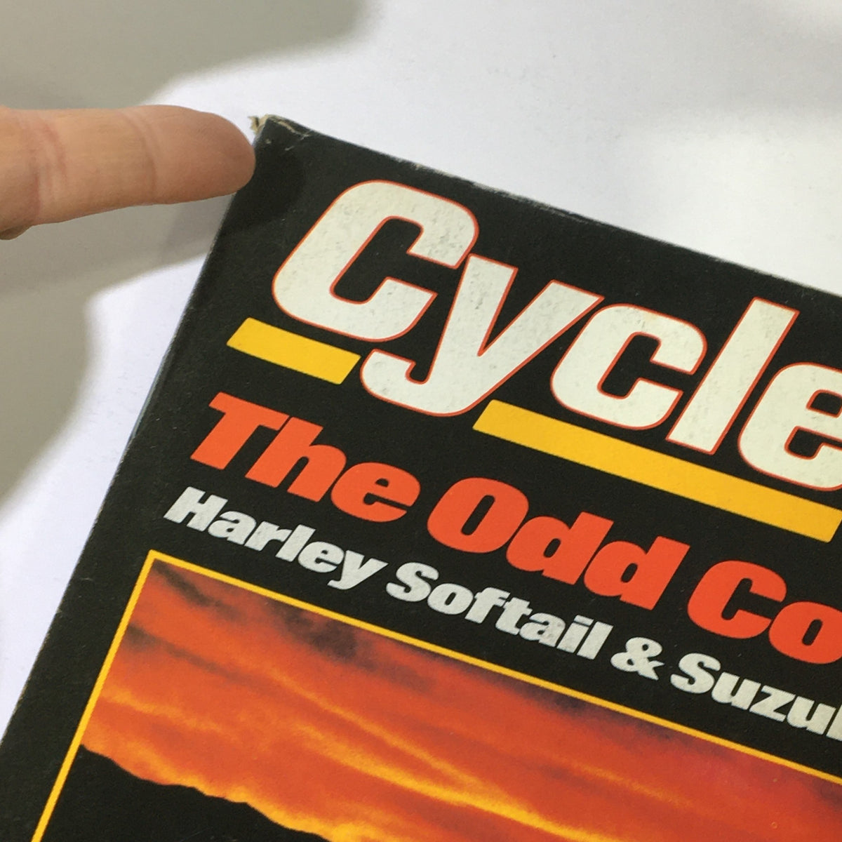 Close-up of the cover of VTG Cycle Magazine May 1984 featuring Harley Softail & Suzuki 1150. The magazine showcases vintage motorcycle culture with bold colors and graphics.