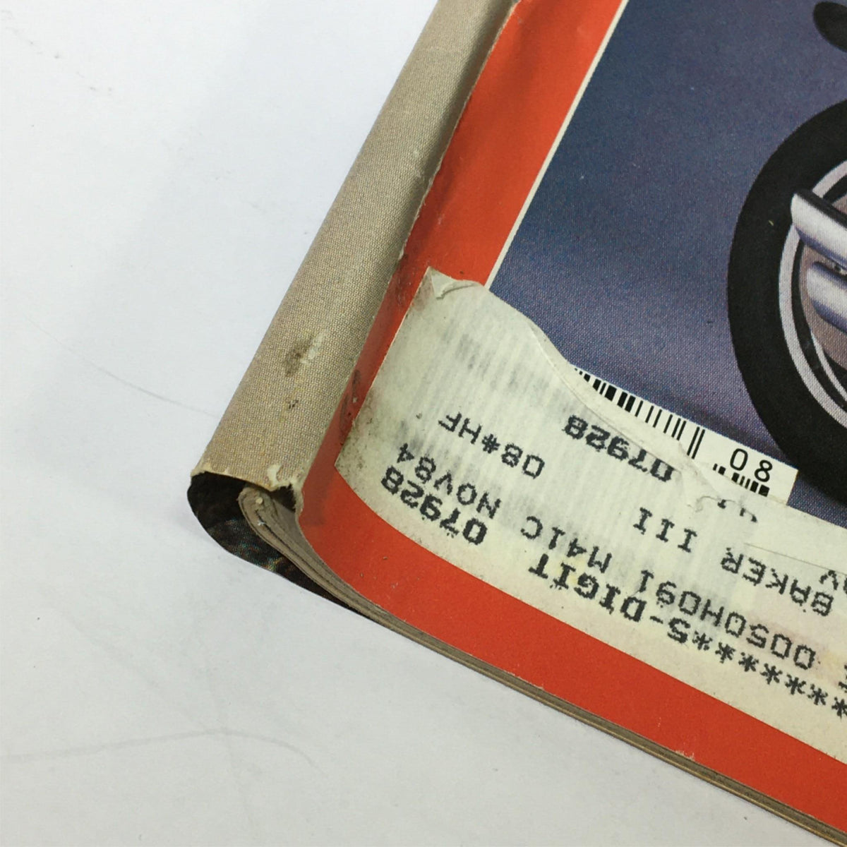 Close-up view of the spine of the VTG Cycle Magazine August 1984, displaying the magazine's worn edges and address label, preserving the nostalgia of vintage motorcycle culture.