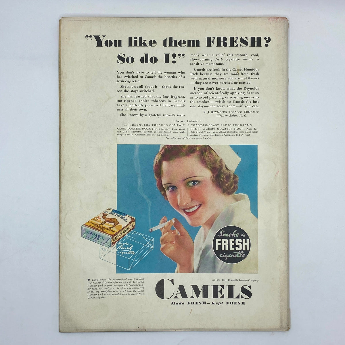 Back cover advertisement for Camels cigarettes featuring a smiling woman from The New Yorker Complete Magazine March 19, 1932.