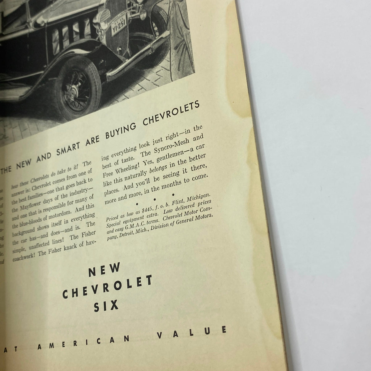 Advertisement for Chevrolet cars featured in The New Yorker April 16, 1932, highlighting their affordable luxury and contemporary design.
