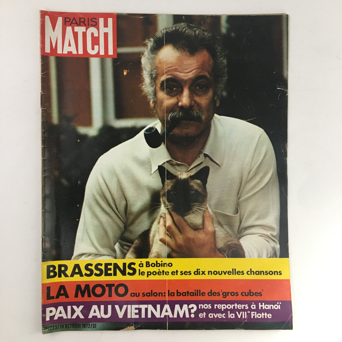 Cover of Paris Match Magazine October 1972 featuring Georges Brassens holding a cat, discussing music and culture.