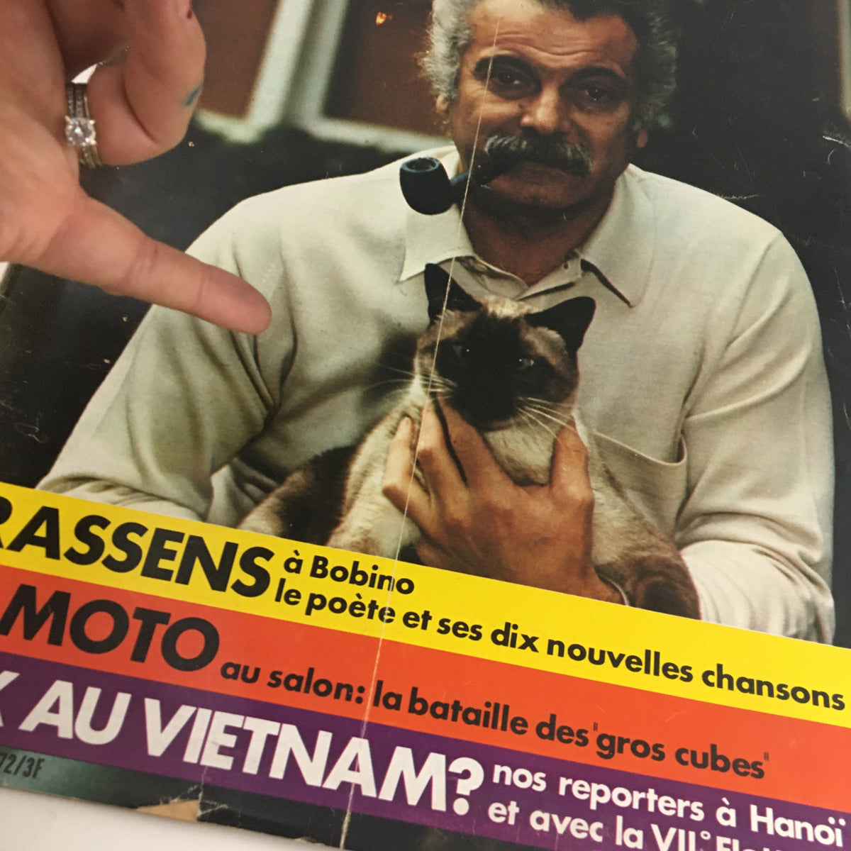 Close-up of the cover of Paris Match Magazine October 1972 with Georges Brassens, showcasing vintage design and historical context.