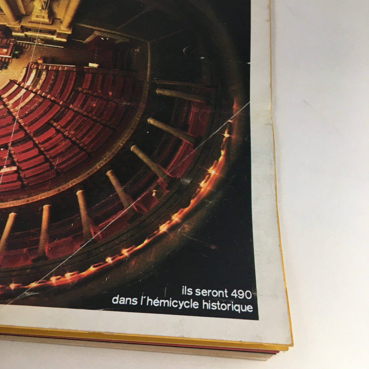 Interior view of a historical amphitheater featured in the Paris Match Magazine March 1973, showcasing vibrant seating and architectural details.