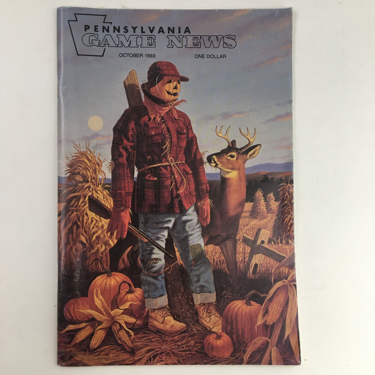 Cover of Pennsylvania Game News October 1993 featuring a scarecrow, deer, and pumpkins, highlighting outdoor culture and hunting themes.