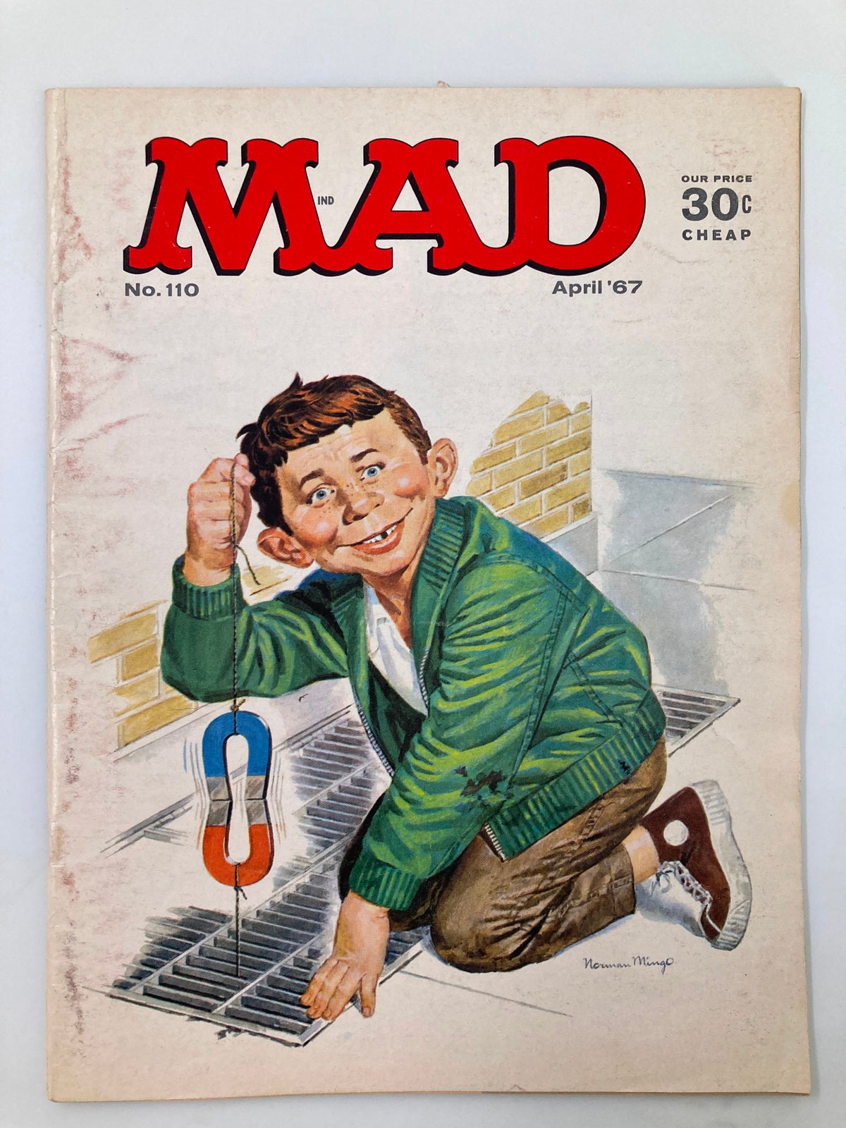 Cover of Mad Magazine April 1967 No. 110 featuring a smiling boy with a magnet, illustrating the whimsical Magnet Trick theme.