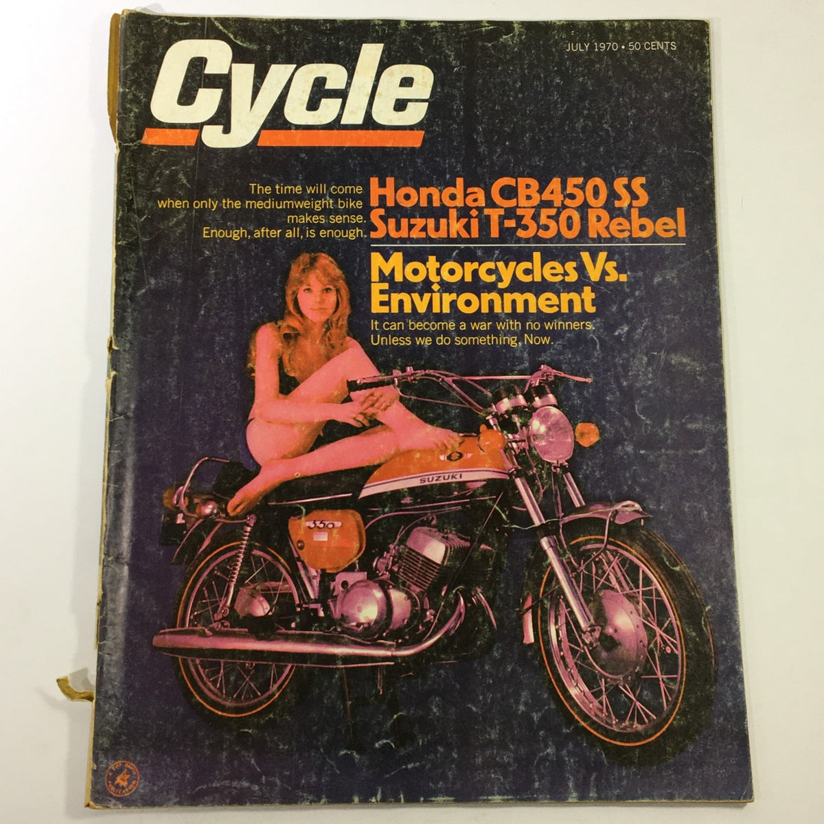 Vintage July 1970 Cycle magazine featuring Honda CB450 SS and Suzuki T-350 Rebel on the cover with a model, showcasing iconic motorcycle culture.