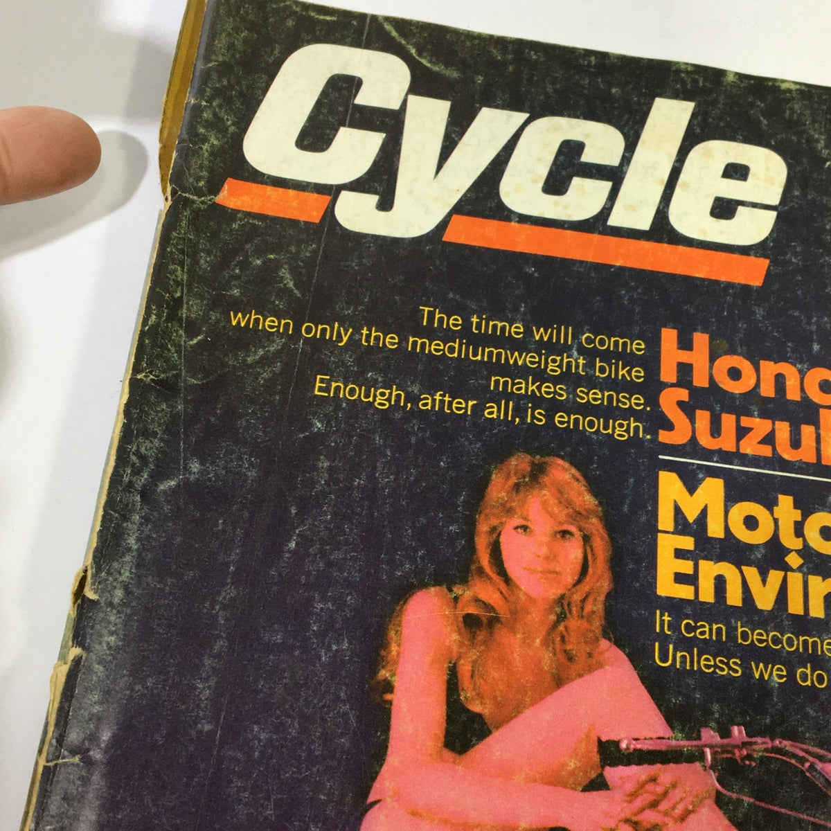 Detailed view of the title and cover text of the July 1970 Cycle magazine, featuring Honda CB450 SS, Suzuki T-350 Rebel, and environmental commentary.