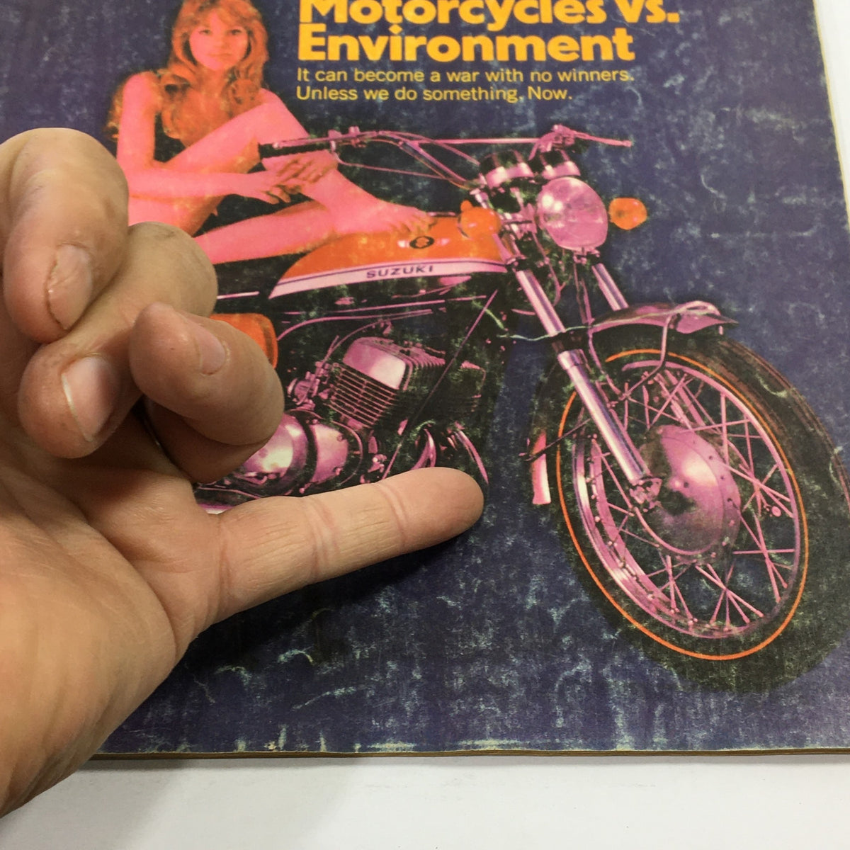 Vintage magazine cover from July 1970 featuring the title 'VTG Cycle Magazine July 1970 - Honda CB450 SS / Suzuki T-350 Rebel'. The cover showcases a Suzuki motorcycle alongside a model, highlighting the cultural significance of motorcycles in the 1970s.