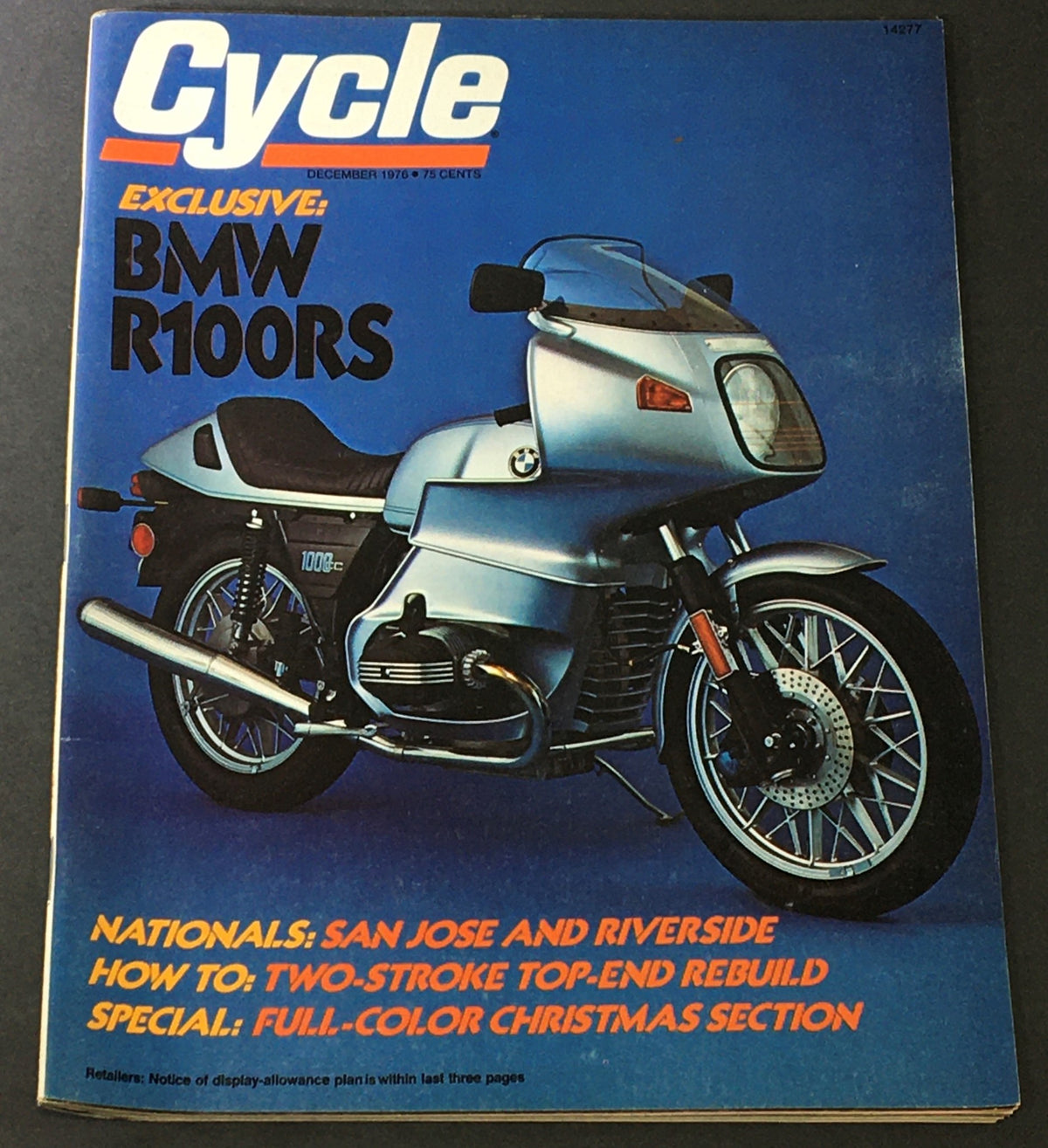 Cover of VTG Cycle Magazine December 1976 featuring the BMW R100RS motorcycle. Highlights include coverage of the San Jose and Riverside Nationals and articles on motorcycle technology, capturing the essence of 1970s biking culture.