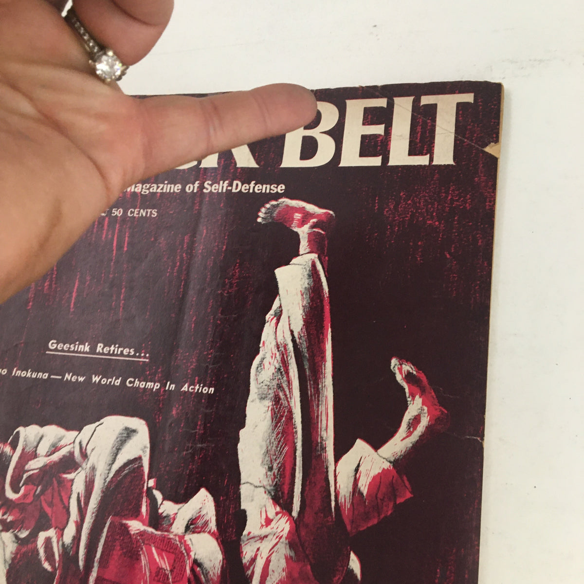 Close-up of Black Belt Magazine February 1966 cover showing Isao Inokuma's wrestling technique, part of the martial arts collection.