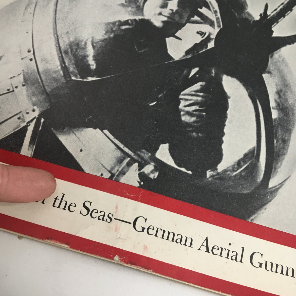 Close-up of Newsweek Magazine February 12, 1940 cover detail featuring the title 'New Terror of the Seas - German Aerial Gunner'.