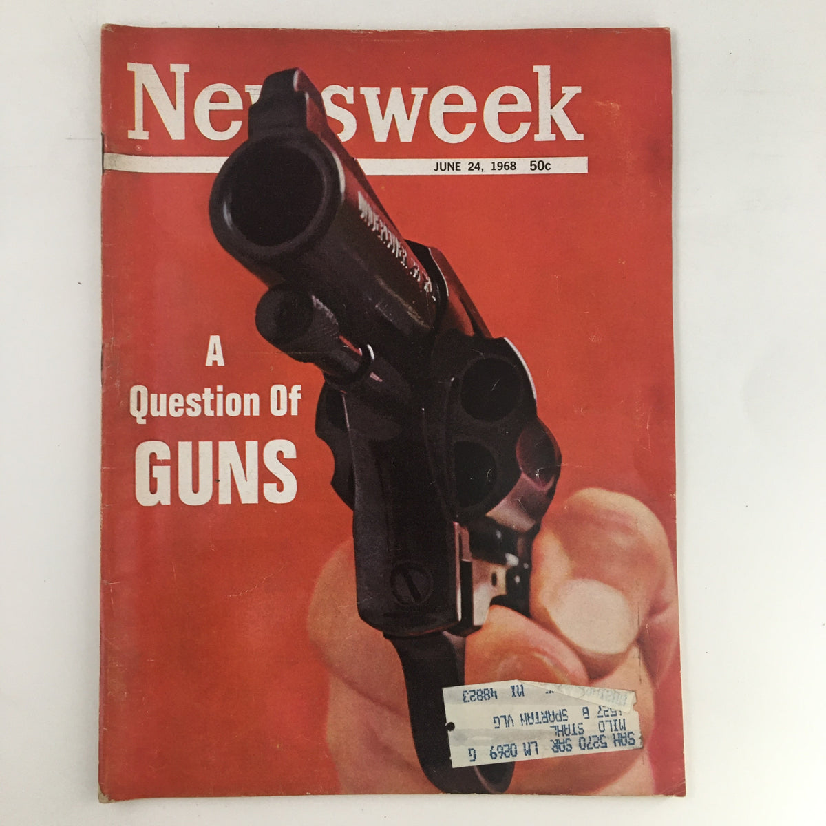 Cover of Newsweek Magazine from June 24, 1968 featuring the title 'A Question of Guns' alongside an image of a handgun, representing historical debates on gun control.