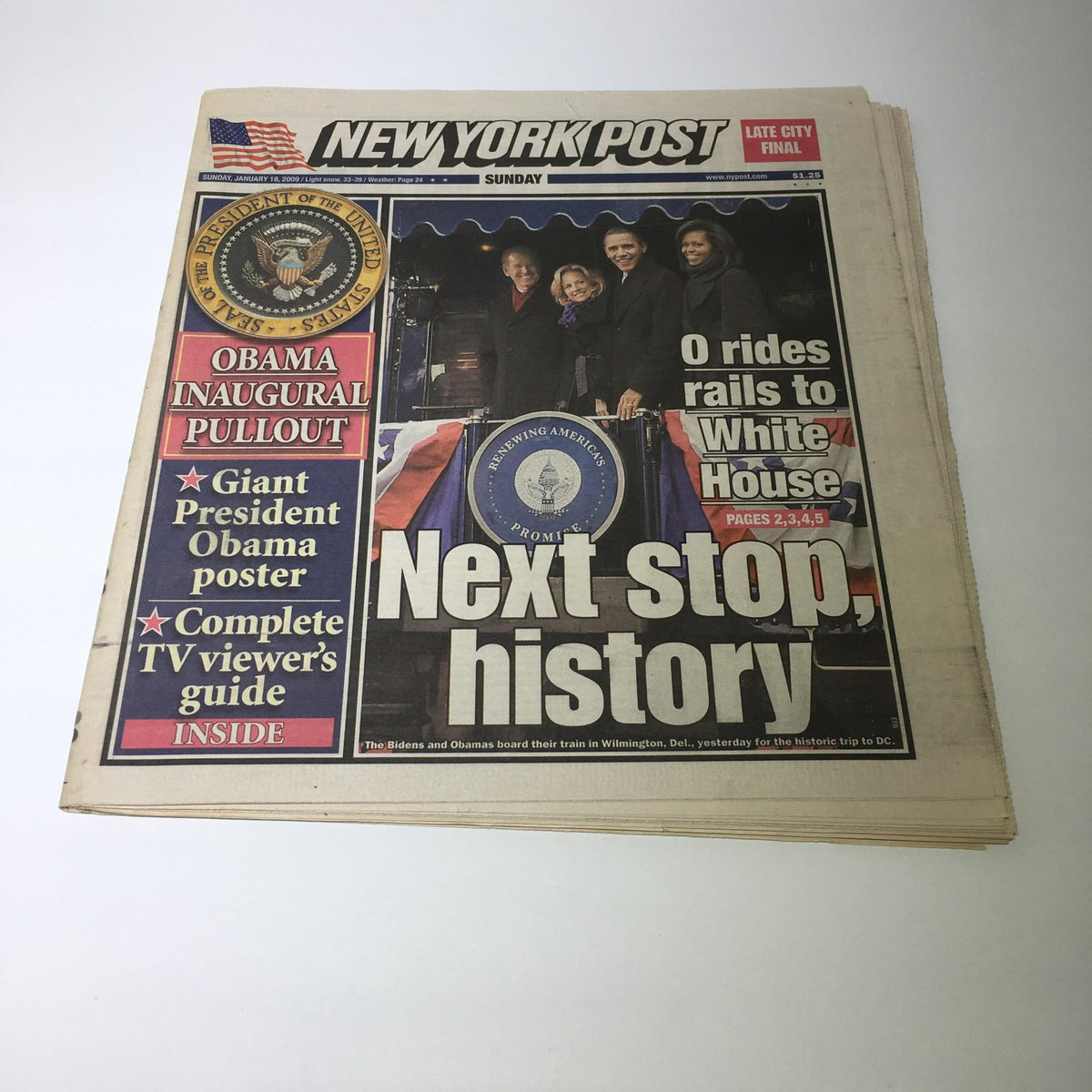 Front page of the NY Post from January 18, 2009, titled 'Next Stop, History', featuring a photo of President Barack Obama and his family during the inaugural train ride.