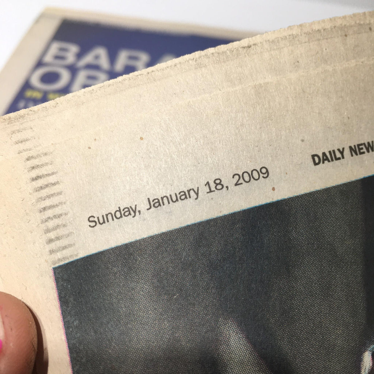 Newspaper clipping from NY Daily News dated January 18, 2009, showing the date in clear print.