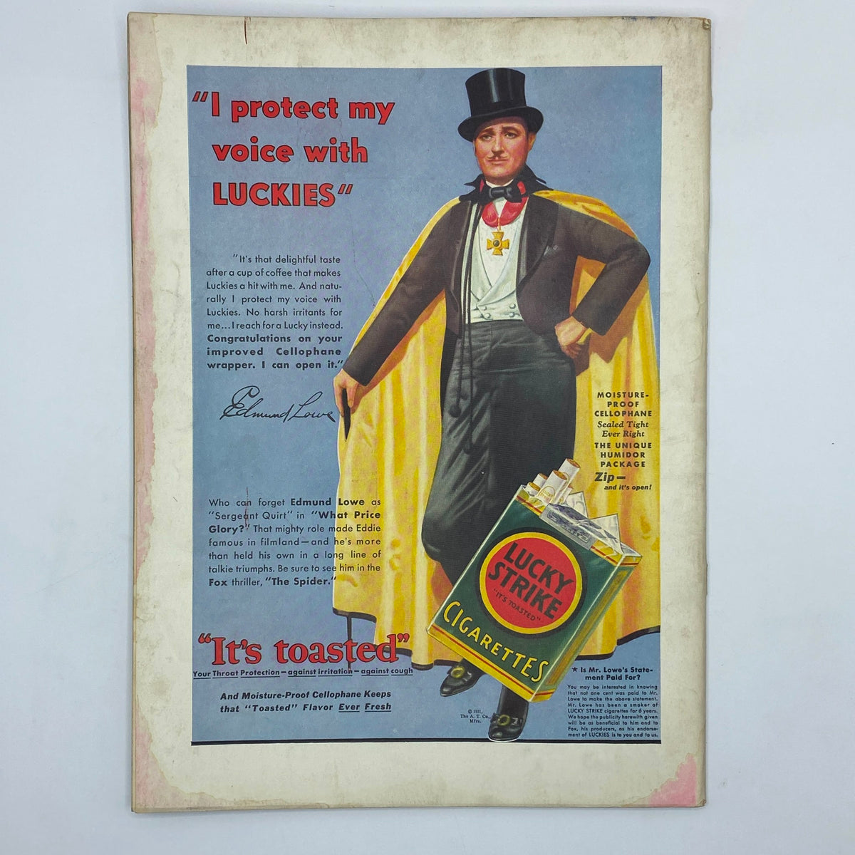Vintage Lucky Strike cigarettes advertisement from The New Yorker magazine November 21, 1931, featuring a man in a top hat and a stylish cape.
