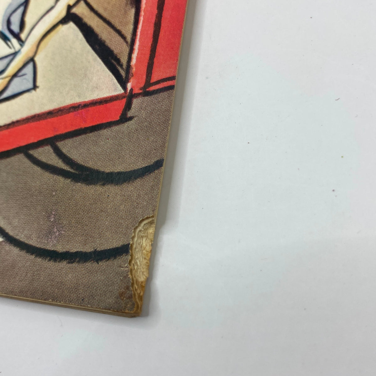 Close-up view of the side edge of The New Yorker Complete Magazine from October 1, 1932, showcasing slight wear and historical charm.