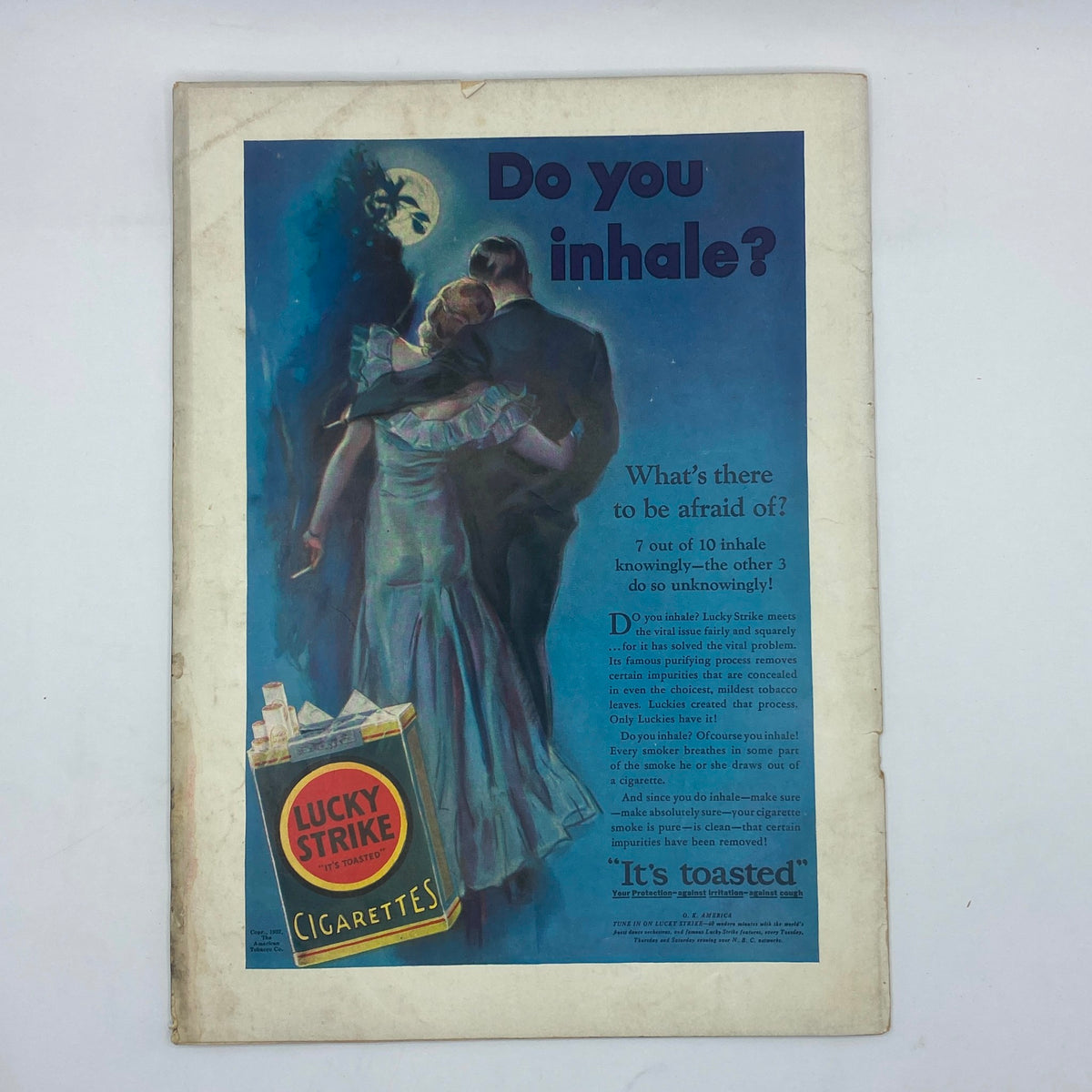 Vintage advertisement from The New Yorker Complete Magazine dated July 30, 1932, featuring a couple embracing under the moonlight with the text 'Do you inhale?' promoting Lucky Strike Cigarettes.