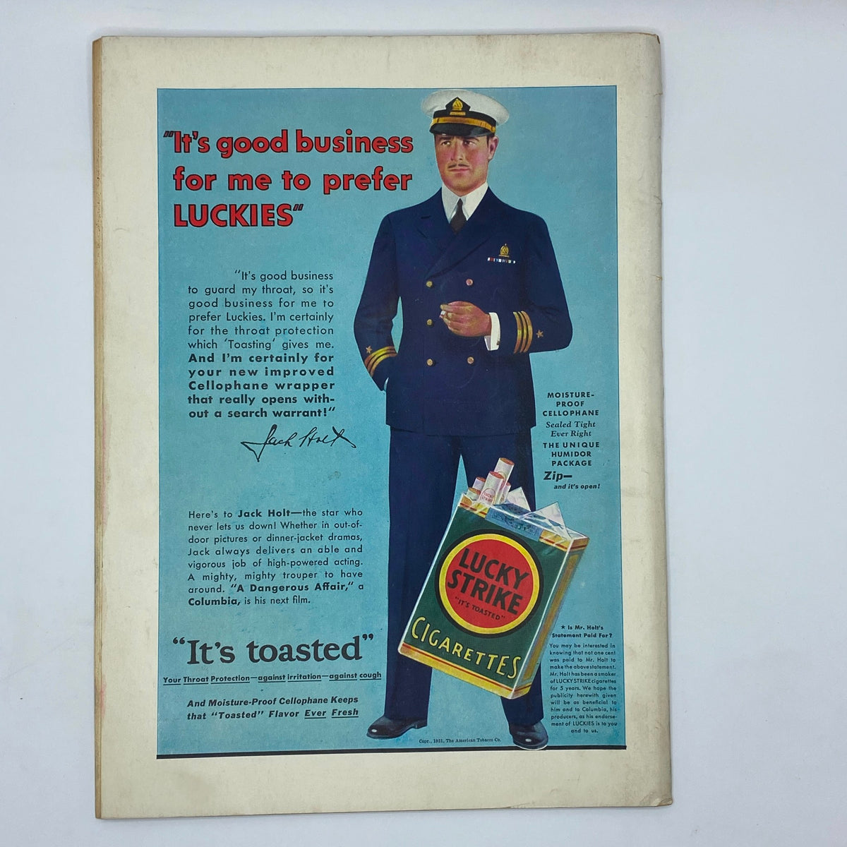 Vintage Lucky Strike cigarette advertisement featuring a dapper man in a naval officer uniform. This image is from The New Yorker Complete Magazine January 2, 1932, promoting the brand's throat protection benefits and Cellophane wrapper.